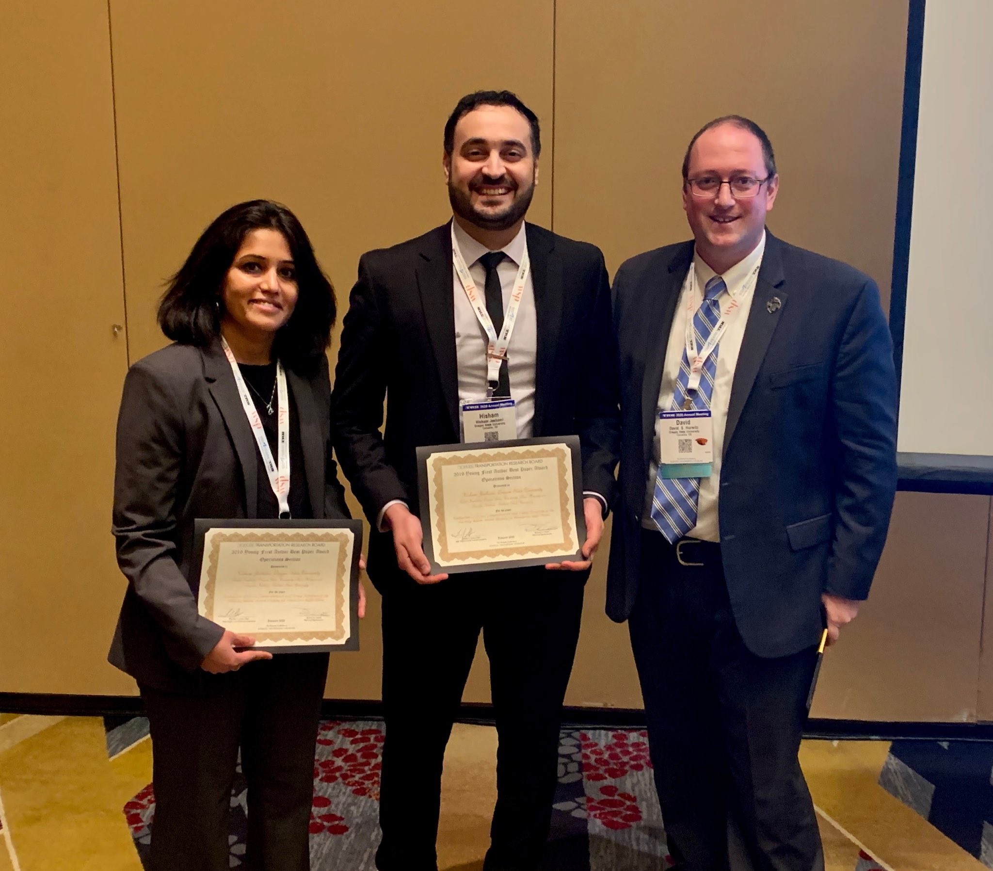 Hisham Jashami receiving a Transportation Research Board best paper award